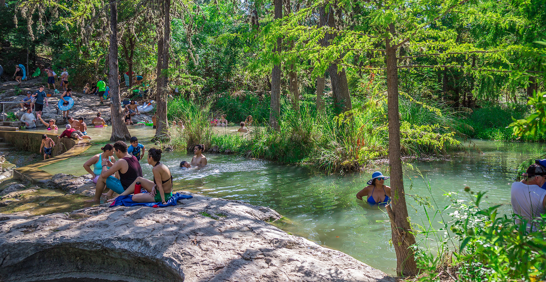 People having fun on Lake Travis and enjoying the summer and water