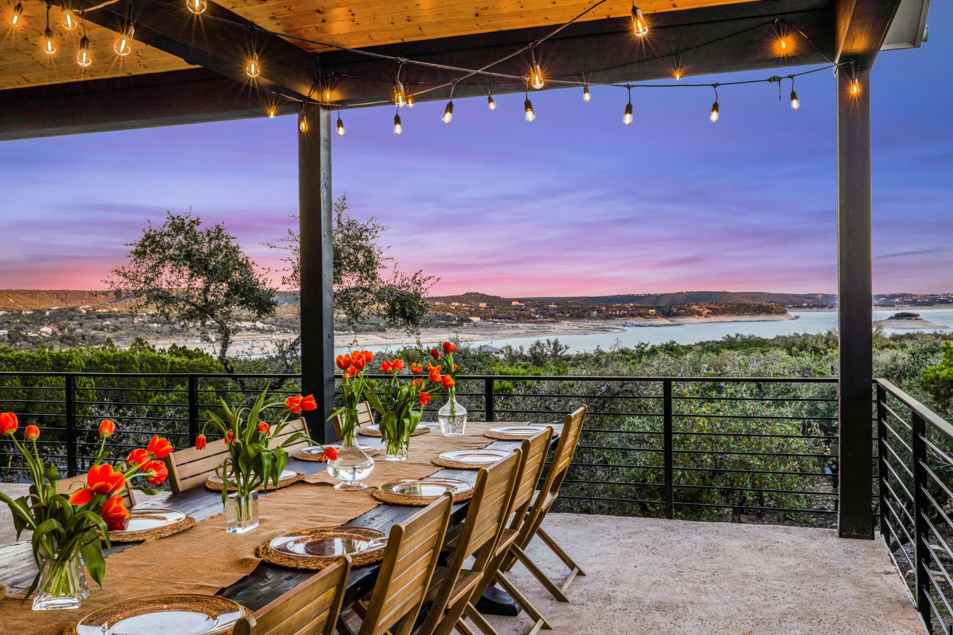 Back patio with plated table and scenic views of the hill country in Texas